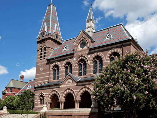 Image of the facade of Gallaudet University. The building is stone Gothic Revival style architecture.